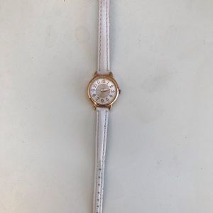 White and rose gold watch